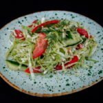 Салат з молодої капусти з овочами