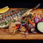 Скумбрія на вогні